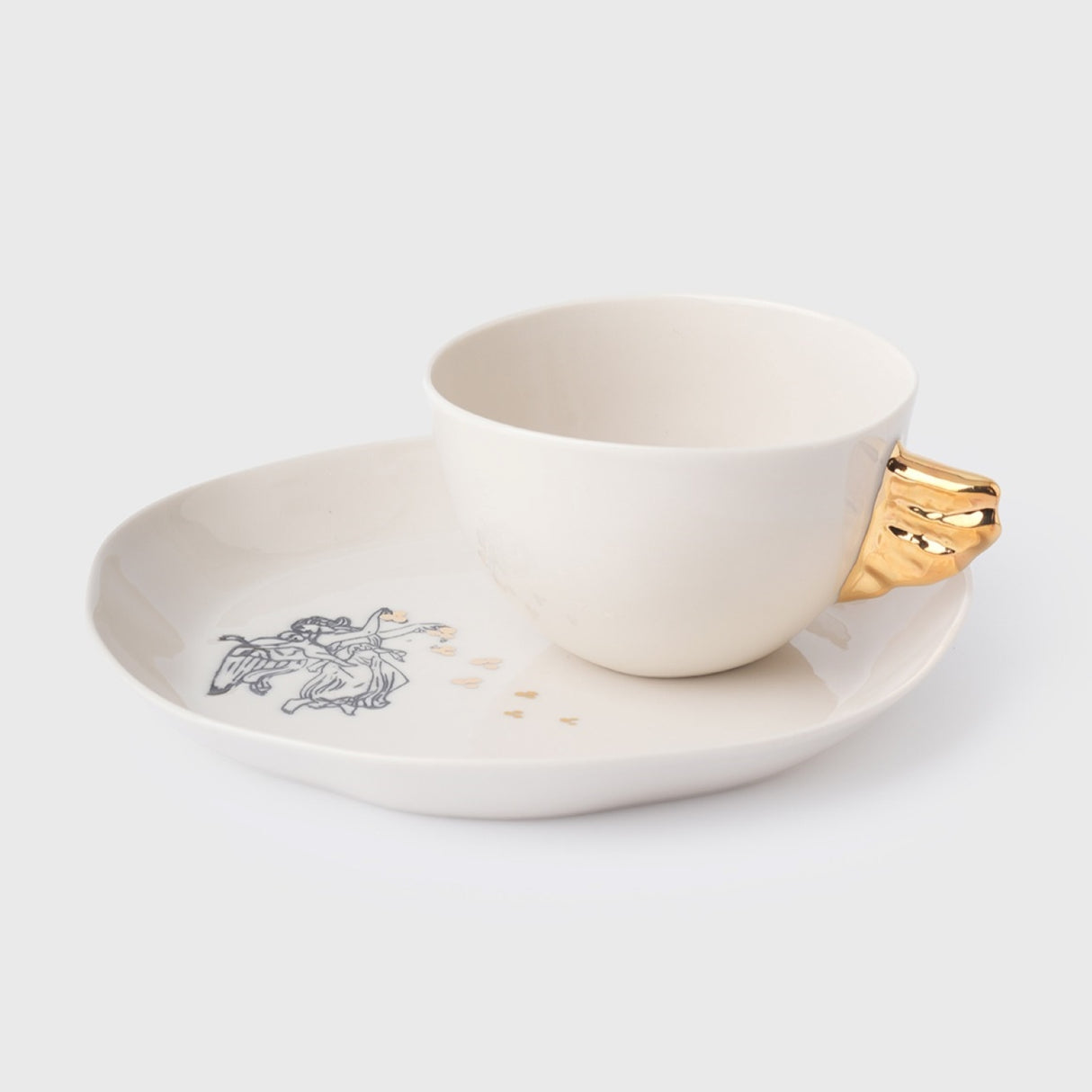 Juego de taza Volans y plato de porcelana "Ángel Madre" de Nuaj: elegante decoración para el hogar con detalles en oro de 24 quilates para interiores con estilo.