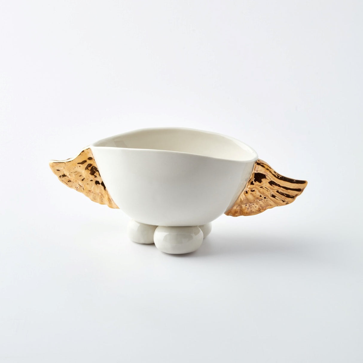 Cuenco de porcelana con alas doradas: vajilla elegante con detalles en oro de 24 quilates para mesas con estilo.